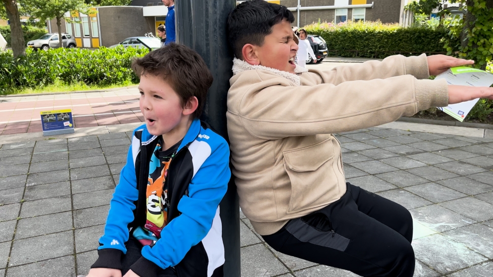 Van stormbaan tot planken: kinderen in extase op Buitenspeeldag